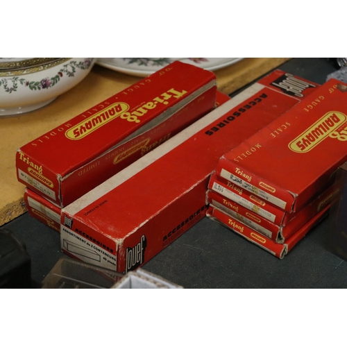 406 - ELEVEN BOXED MODEL RAILWAY ITEMS, TO INCLUDE CARRIAGES, TRACK, VEHICLES, SIGNALS, ETC - TRI-ANG, JOU... 