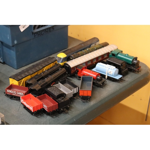 407 - A LARGE QUANTITY OF OO GAUGE MODEL RAILWAY LOCOS AND WAGONS BY HORNBY, TRI-ANG