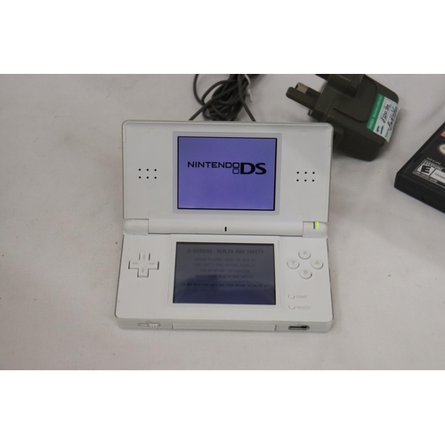 420 - A WHITE NINTENDO DS LITE WITH CHARGER, WORKING AT TIME OF CATALOGUING, NO WARRANTY GIVEN PLUS BRAIN ... 