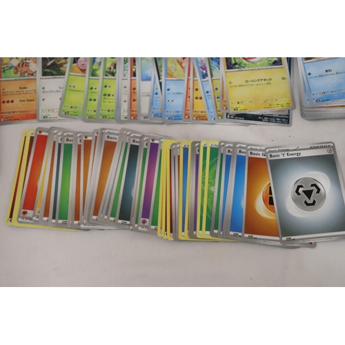 428 - A POKEMON COLLECTOR'S TIN FULL OF JAPANESE CARDS