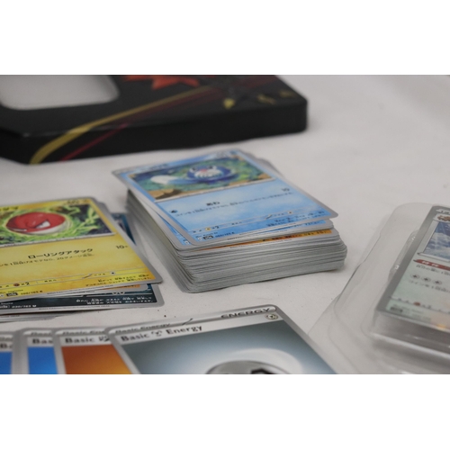 428 - A POKEMON COLLECTOR'S TIN FULL OF JAPANESE CARDS