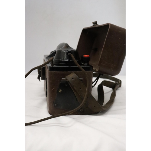 935 - A WORLD WAR 11 MILITARY TELEPHONE IN A LEATHER CASE