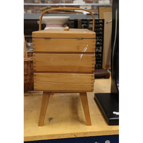 942 - A WOODEN CANTILEVER SEWING BOX