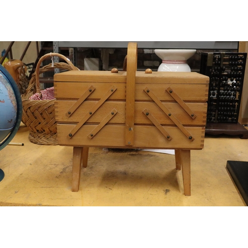 942 - A WOODEN CANTILEVER SEWING BOX