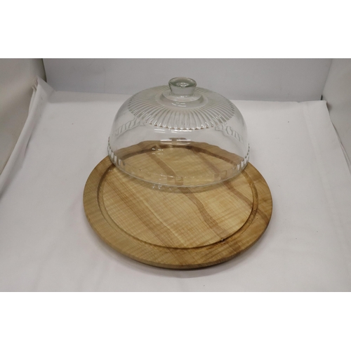 966 - A VINTAGE WOODEN CAKE/CHEESE BOARD WITH GLASS DOME