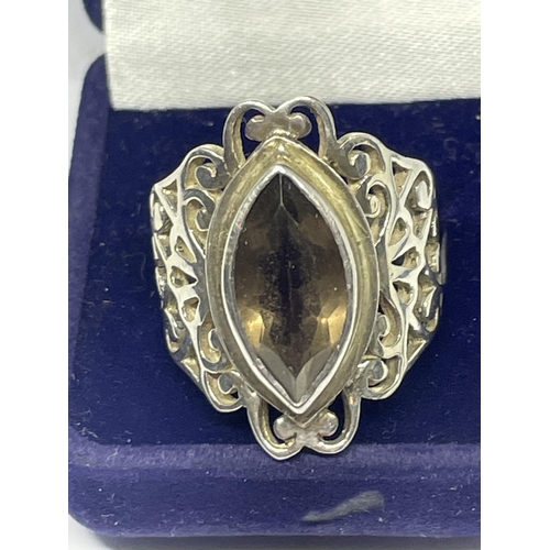 639 - A SILVER DRESS RING WITH A SMOKEY STONE SIZE P/Q IN A PRESENTATION BOX