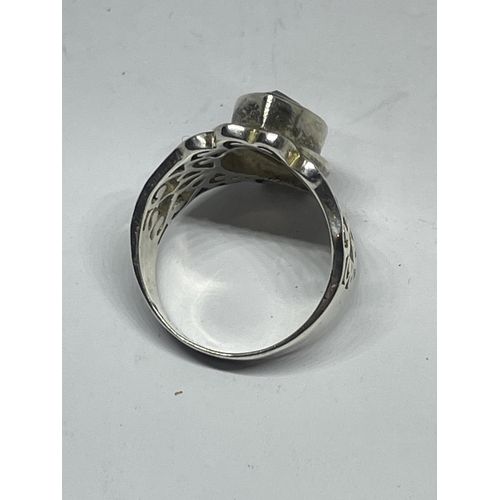 639 - A SILVER DRESS RING WITH A SMOKEY STONE SIZE P/Q IN A PRESENTATION BOX