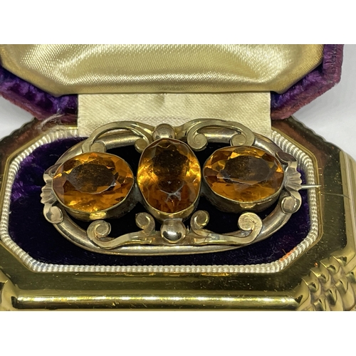 645 - A VINTAGE BROOCH WITH THREE AMBER COLOURED STONES IN ORIGINAL PRESENTATION BOX