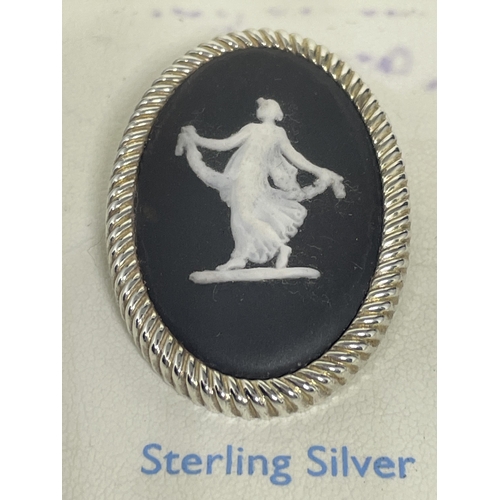 650 - A STERLING SILVER AND BLACK WEDGWOOD JASPERWARE BROOCH DANCING HOURS IN ORIGINAL PRESENTATION BOX