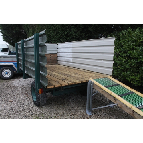 234 - A STABLE YARD TIPPING TRAILER WITH 11' SLIP RAMP IN GOOD WORKING ORDER NO VAT