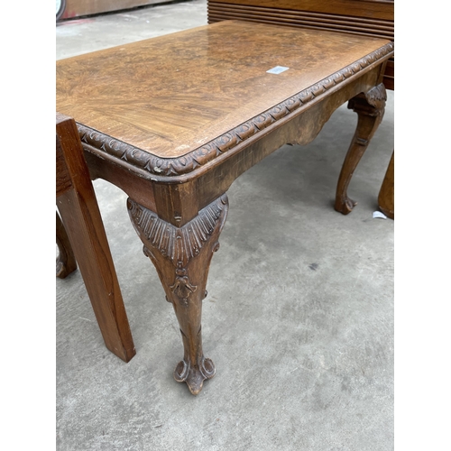 2953 - A RETRO TEAK COFFEE TABLE WITH TILED TOP AND WALNUT CROSSBANDED COFFEE TABLE ON CABRIOLE LEGS