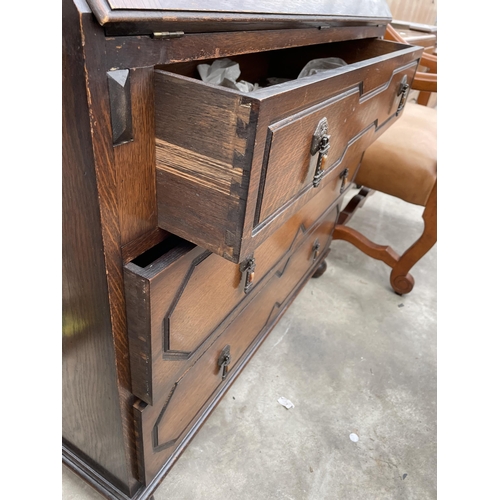 2959 - AN EARLY 20TH CENTURY OAK BUREAU BOOKCASE WITH GLAZED AND LEADED UPPER PORTION 36