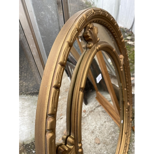 2978 - AN OVAL 19TH CENTURY STYLE GILT EFFECT WALL MIRROR, 37