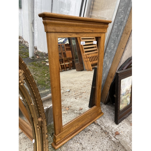 2979 - AN OAK J B GLOBAL OVER MANTEL MIRROR, 35