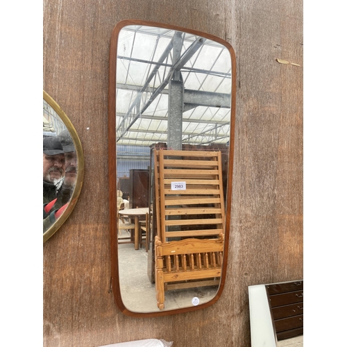 2983 - A RETRO WALL MIRROR WITH TEAK BACK, 29