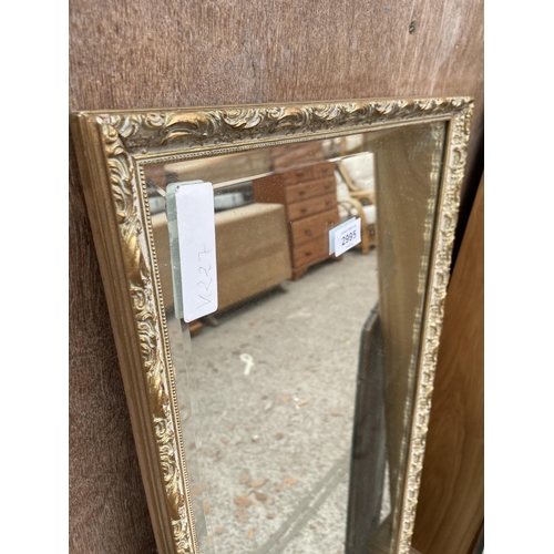 2995 - A FRAMELESS WALL MIRROR AND BEVEL EDGE MIRROR