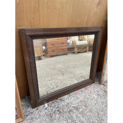 2999 - AN EDWARDIAN OAK FRAMED WALL MIRROR, 31