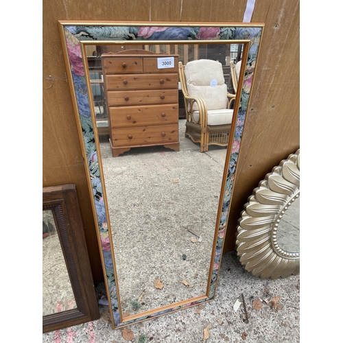 3000 - A MODERN WALL MIRROR WITH FLORAL EDGE, 43