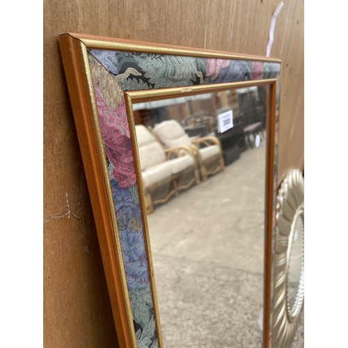 3000 - A MODERN WALL MIRROR WITH FLORAL EDGE, 43