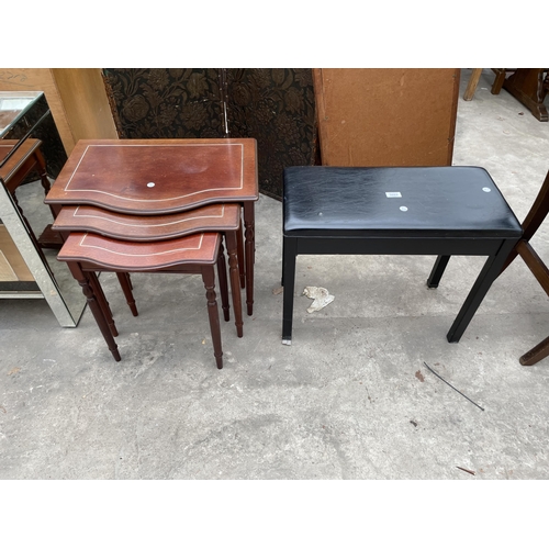 3053 - A BLACK FAUX LEATHER PIANO STOOL AND NEST OF THREE MAHOGANY TABLES