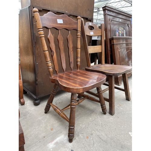 3056 - A MID TWENTIETH CENTURY OAK LADDER BACK CHAIR AND HARDWOOD KITCHEN CHAIR