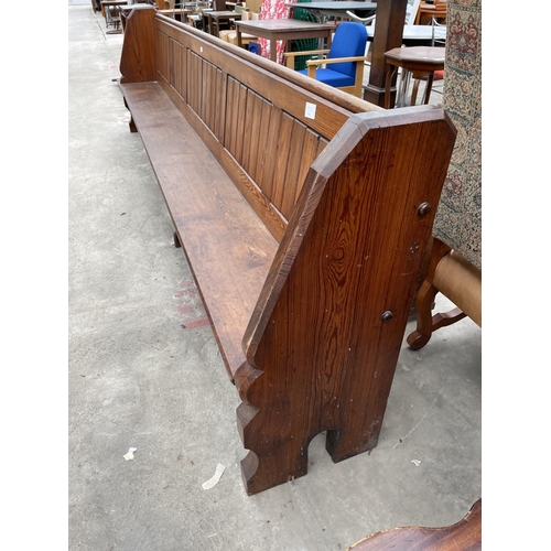 3057 - A VICTORIAN PITCH PINE PEW, 12'5