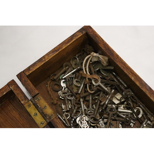 1016 - A COLLECTION BOX CONTAINING CIRCA 1900 FURNITURE KEYS