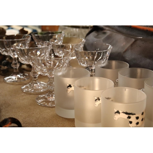 1038 - SIX GLASS SUNDAE DISHES TOGETHER WITH SIX DRINKING GLASSES ETCHED WITH ANIMALS