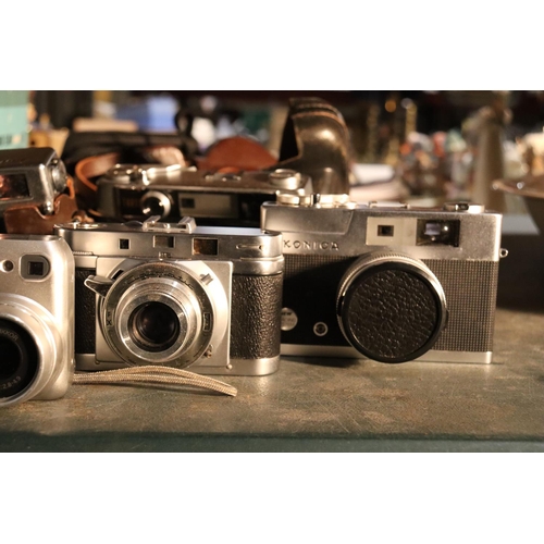 1046 - A QUANTITY OF VINTAGE CAMERAS TO INCLUDE NIKON, ILFORD SPORTSMASTER, KONICA, ETC.,