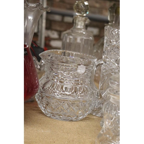 1079 - A QUANTITY OF GLASSWARE TO INCLUDE A RED DARTINGTON BOWL, SWEET JAR, VASES, ETC.,