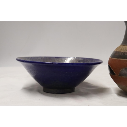 1090 - A BLUE AND PEARLESCENT STUDIO POTTERY STYLE BOWL TOGETHER WITH A STONEWARE JUG