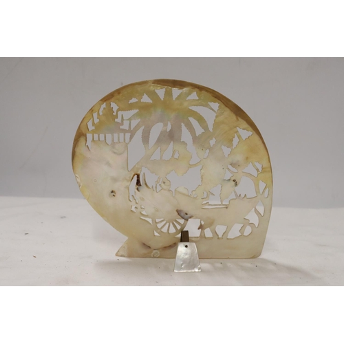 1112 - A MOTHER OF PEARL CARVING OF AN ASIAN SCENE, HEIGHT 18CM