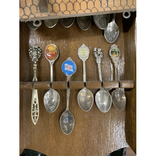 1252 - A QUANTITY OF COLLECTABLE THIMBLES AND SOUVENIR TEASPOONS WITH DISPLAY SHELVES