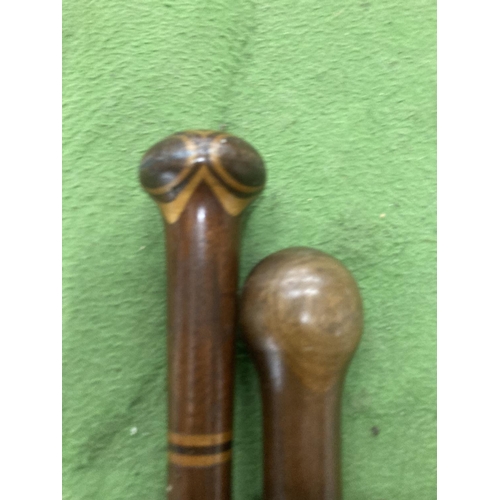 1302 - TWO VINTAGE WALKING STICKS ONE WITH TURNING SECTIONS