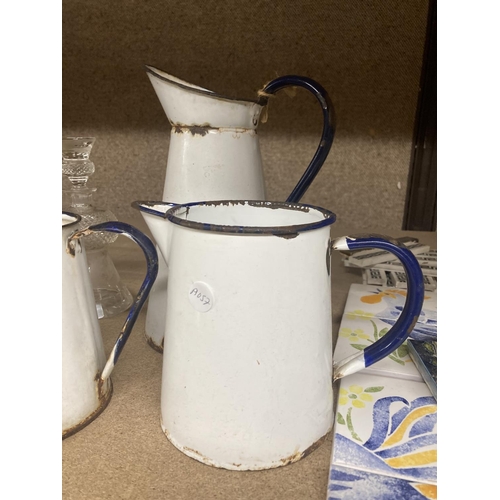 1328 - THREE GRADUCATED VINTAGE ENAMEL JUGS