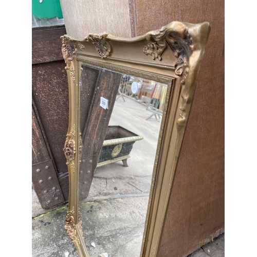 3009 - A GILT FRAMED WALL MIRROR, 30