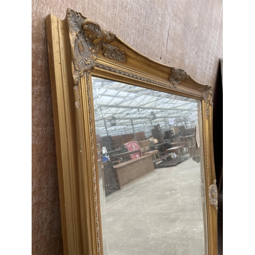 3014 - A MODERN GILT FRAMED BEVEL EDGE WALL MIRROR, 53