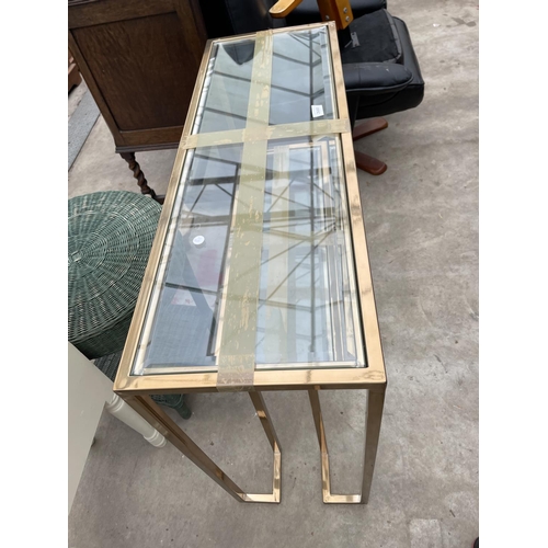 2680 - A GOLD COLOURED METALWARE TWO TIER CONSOLE TABLE WITH GLASS SHELVES AND MATCHING COFFEE TABLE