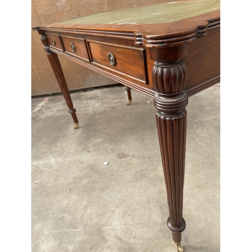 2951 - A REGENCY STYLE MAHOGANY TABLE ENCLOSING THREE DRAWERS AND THREE SHAM DRAWERS WITH INSET LEATHER TOP... 