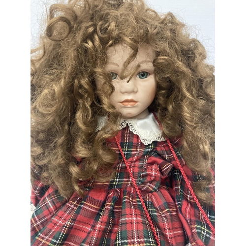 460 - AN ALBERON DOLL IN A TARTAN OUTFIT