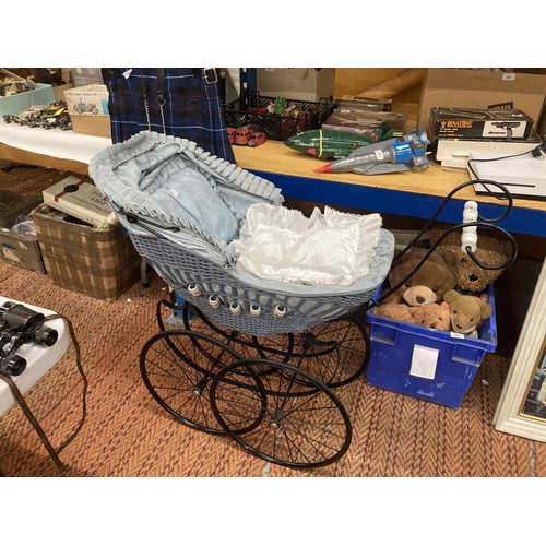 475 - A LARGE VINTAGE PRAM WITH CERAMIC HANDLE AND DECORATION TO THE SIDE