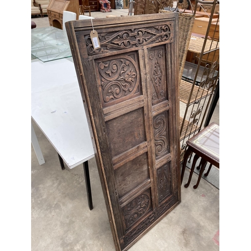 2930 - AN OAK JACOBEAN STYLE CARVED PANEL, 54.5