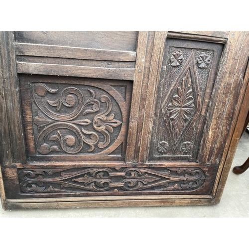 2930 - AN OAK JACOBEAN STYLE CARVED PANEL, 54.5