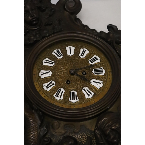 4 - A BRONZE CLOCK WITH NEPTUNE AND DOLPHIN DECORATION