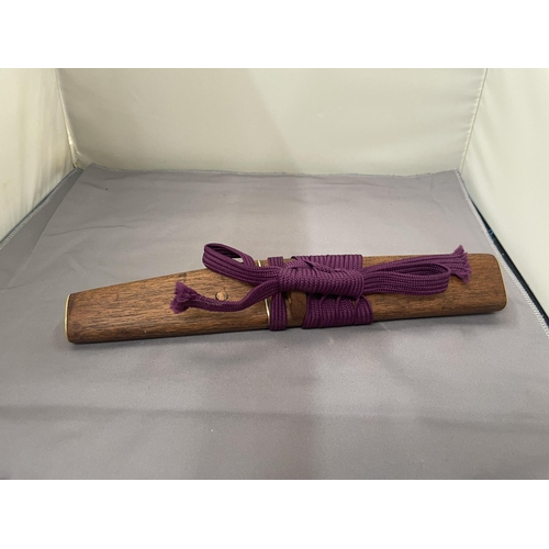 55 - A VINTAGE JAPANESE TANTO WITH PURPLE SILK WRAP