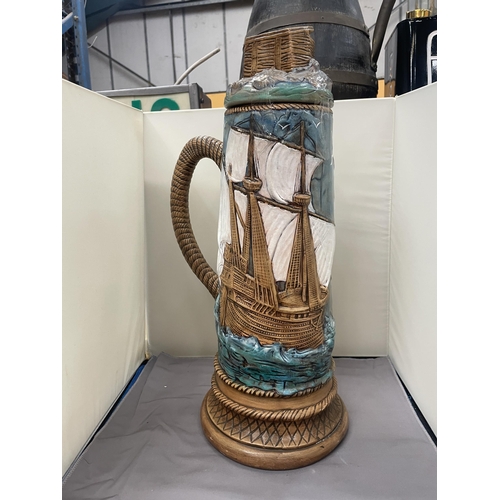 74 - A LARGE ART AND CRAFTS GALLEON LIDDED JUG