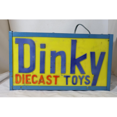 318 - AN ILLUMINATED DINKY DIECAST TOY'S SIGN - 41 X 23 CM