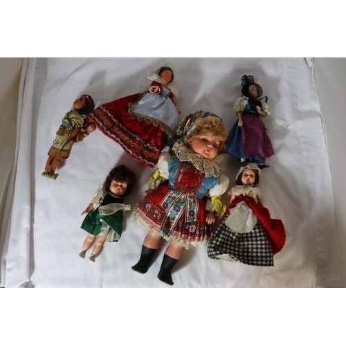 350 - A LARGE COLLECTION OF DOLLS FROM AROUND THE WORLD