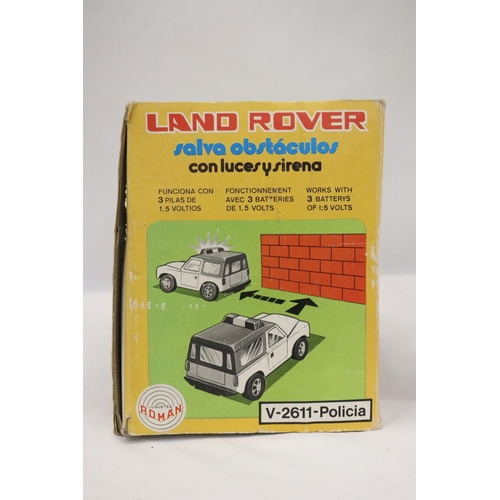 417 - A ROMAN TOYS, BOXED LANDROVER, SERIES 2611, POLICE JEEP