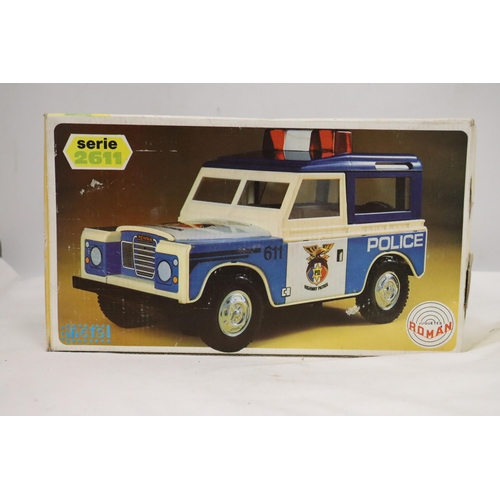 417 - A ROMAN TOYS, BOXED LANDROVER, SERIES 2611, POLICE JEEP